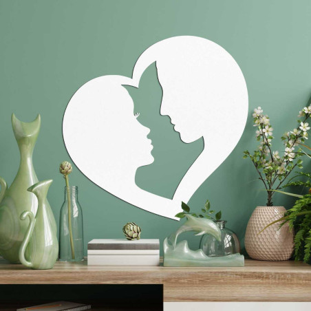 Ozdoba w kształcie serca, w której połączone są kontury dwóch twarzy.