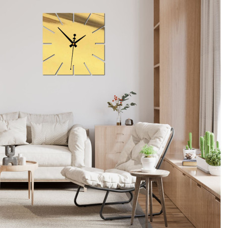 Czarny zegar ścienny bez cyfr o nowoczesnym designie