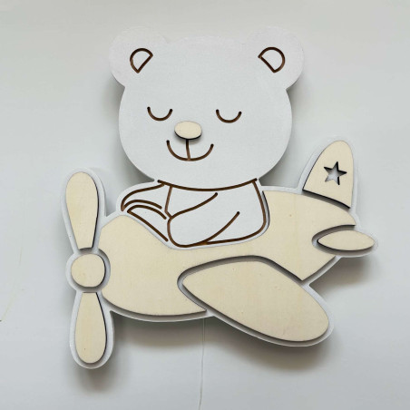 Dziecięca lampa LED Miś w samolocie łączy w sobie bezpieczne oświetlenie, jakość wykonania i stylowy design